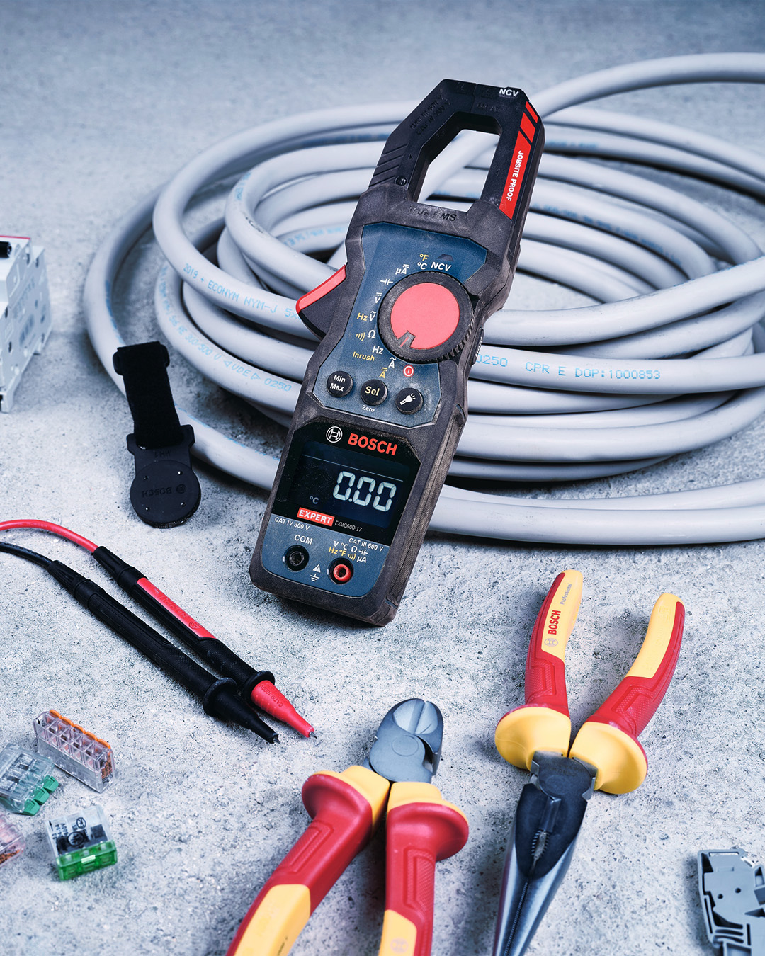 Bosch Expert clamp meter styled on site with cable and insulated pliers