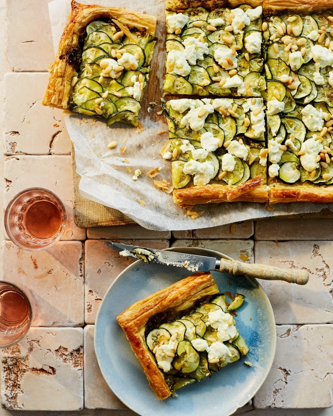 Courgette, pesto and ricotta puff pastry tart shot from above